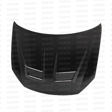 Load image into Gallery viewer, Seibon 10-11 VW Golf GTI 5K/MK6 DV Carbon Fiber Hood w/ Shaved Emblem