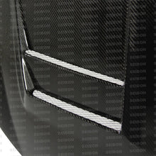 Load image into Gallery viewer, Seibon 10-11 VW Golf GTI 5K/MK6 DV Carbon Fiber Hood